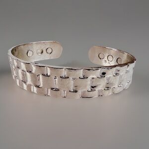 Beautiful silvertone, weighted cuff bracelet